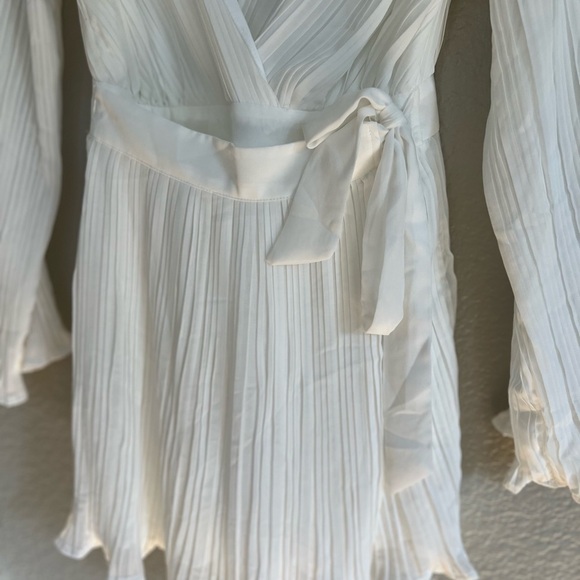 Embrace Your Beauty Ivory Pleated Long Sleeve Skort Romper - Picture 9 of 9